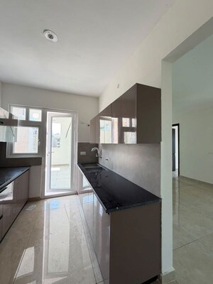 Kitchen in 3 BHK Apartment at Maxxus Elanza, International Airport Road – for Rent