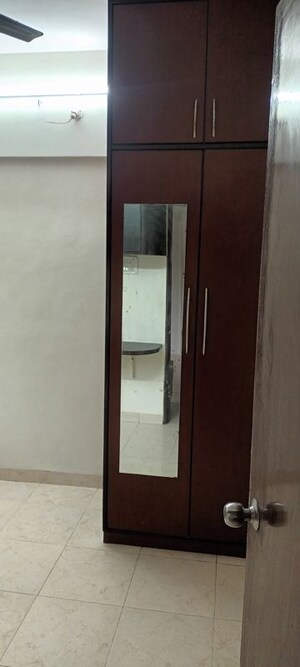 Room in 2 BHK Apartment at Seawood Ganpati Complex, Nerul Sector 27 – for Rent