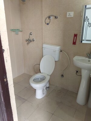 Bathroom in 1 BHK Apartment at Nilaya Greens, Raj Nagar Extension – for Sale