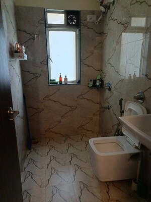 Bathroom in 3 BHK Apartment at Conwood Enclave, Vasant Vihar – for Rent