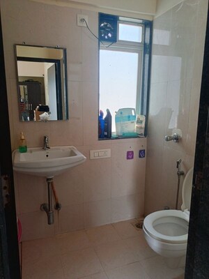 Bathroom in 3 BHK Apartment at Conwood Enclave, Vasant Vihar – for Rent