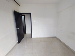 Room in 2 BHK Apartment at Shree Tirupati STG Signature Residency, Patlipada – for Rent