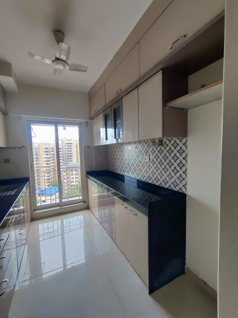 Kitchen, shree-tirupati-stg-signature-residency 2 Bedroom 735 Sq.Ft. Apartment In Patlipada Thane 10751942