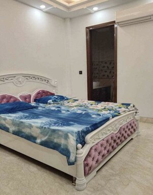 Bedroom in 3 BHK Builder Floor at Rajouri Garden – for Rent
