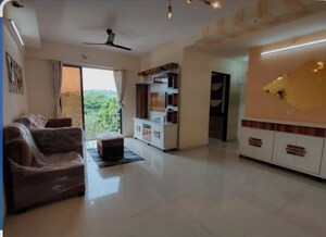 Living Room in 1 BHK Apartment at Lodha Amara, Kolshet Road – for Rent