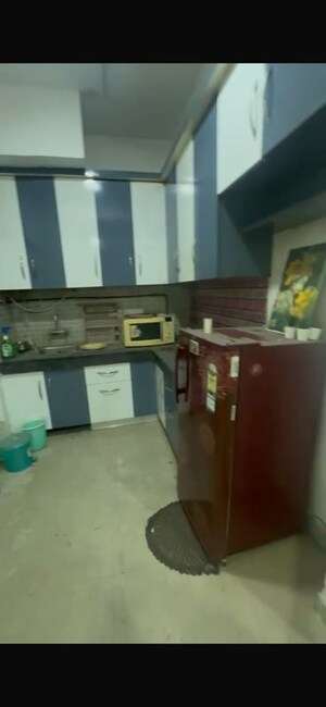 Kitchen in 2 BHK Apartment at Nimbus The Golden Palm, Sector 168 – for Rent