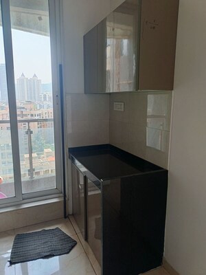 Kitchen in 3 BHK Apartment at Rosa Manhattan, Ghodbunder Road – for Rent