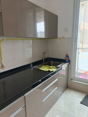 Kitchen in 3 BHK Apartment at Rosa Manhattan, Ghodbunder Road – for Rent