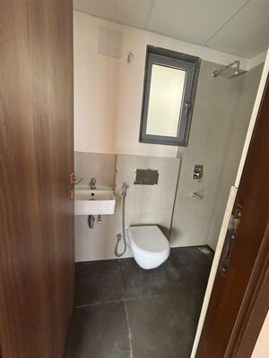 Bathroom in 2 BHK Apartment at Piramal Vaikunth, Balkum Pada – for Rent