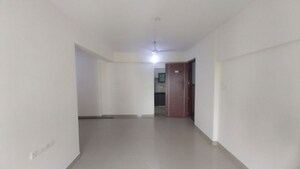 Living Room in 2 BHK Apartment at Ivory Towers CHS LTD, Bhakti Park – for Sale