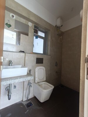 Bathroom in 2 BHK Apartment at Dynamix Avanya, Dahisar East – for Rent