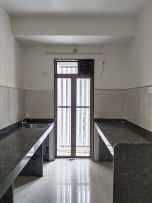 Building Lobby in 1 BHK Apartment at Runwal My City Phase II Cluster 05, Dombivli East – for Rent