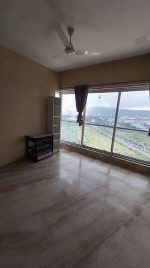 Room in 2 BHK Apartment at Ajmera Zeon, Bhakti Park – for Sale