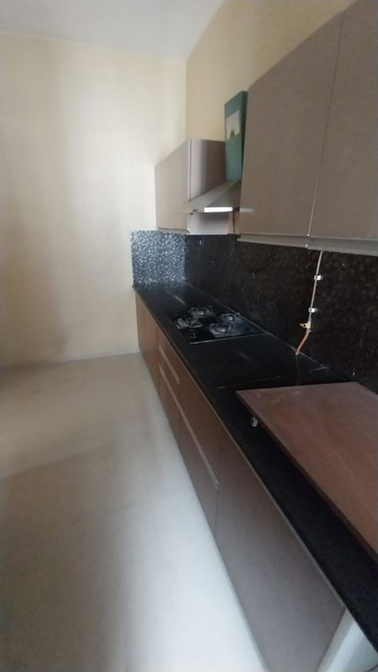 Kitchen, ajmera-zeon 2 Bedroom 935 Sq.Ft. Apartment In Bhakti Park Mumbai 10752072