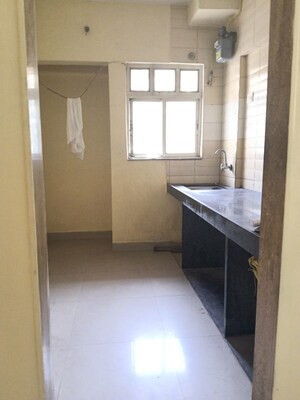 Kitchen in 2 BHK Apartment at Dosti Group Maitri Vatika, Kalwa – for Rent