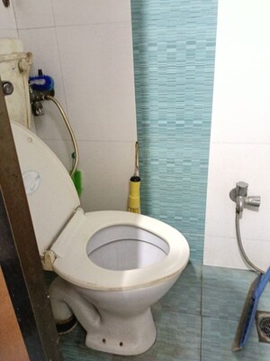 Bathroom in 2 BHK Apartment at Dosti Group Maitri Vatika, Kalwa – for Rent