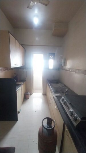 Kitchen in 3 BHK Apartment at Cosmic Heights, Bhakti Park – for Sale