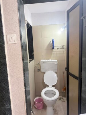 Bathroom in 1.5 BHK Apartment at Dosti West County, Balkum Pada – for Rent