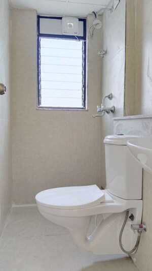 Bathroom in 1 BHK Apartment at Runwal Primrose, Dombivli East – for Rent