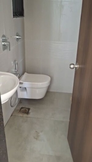 Bathroom in 1 BHK Apartment at Puneet Shivalaya, Tagore Nagar – for Sale