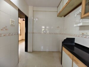 Kitchen in 1 BHK Apartment at Preeti Sagar CHS, Borivali West – for Rent