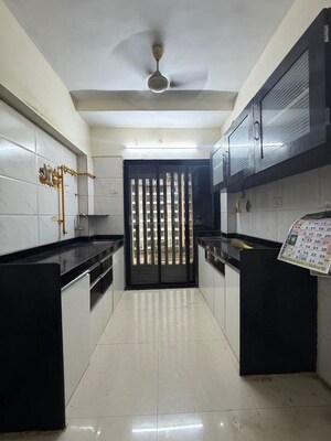 Kitchen in 2 BHK Apartment at Parikh Peninsula Park, Virar West – for Rent