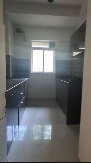 Kitchen in 1 BHK Apartment at Lodha Amara, Kolshet Road – for Rent