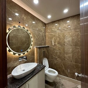 Bathroom in 4 BHK Apartment at Adani Samsara Vilasa, Sector 63 – for Rent