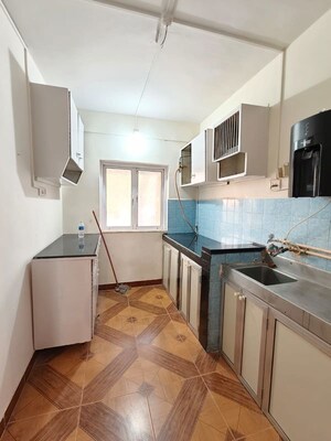 Kitchen in 2 BHK Apartment at Gokuldham Complex, Goregaon East – for Rent