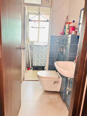 Bathroom in 1 BHK Apartment at Lodha Amara, Kolshet Road – for Rent