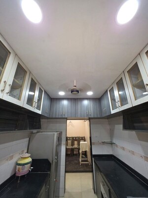 Kitchen in 2 BHK Apartment at Raj Tulsi Sahyadri, Khanda Colony – for Rent