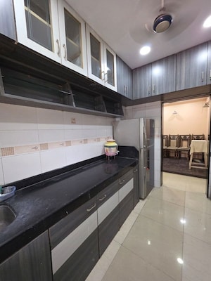 Kitchen in 2 BHK Apartment at Raj Tulsi Sahyadri, Khanda Colony – for Rent