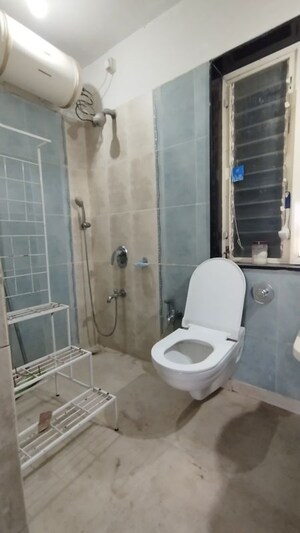 Bathroom in 3 BHK Apartment at Ashish Swapnalok Towers, Goregaon East – for Rent