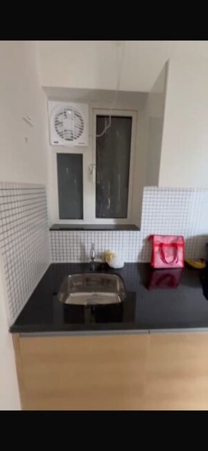 Kitchen in 2 BHK Apartment at Omkar Signet, Malad East – for Rent
