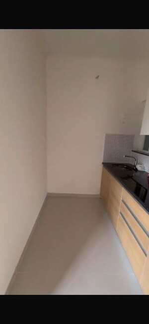 Kitchen in 2 BHK Apartment at Omkar Signet, Malad East – for Rent