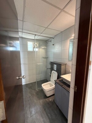 Bathroom in 3 BHK Apartment at Poorvi Champions Height, Harlur – for Rent