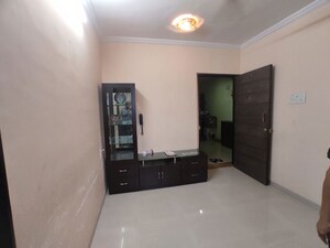 Living Room in 1 BHK Apartment at Puranik Hometown, Ghodbunder Road – for Rent
