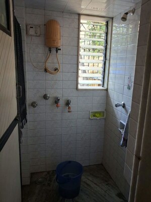 Bathroom in 1 BHK Apartment at Jai Ashirwad CHS, Dahisar West – for Sale