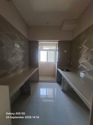 Kitchen in 2 BHK Apartment at Raunak Unnathi Woods Supreme, Ghodbunder Road – for Rent