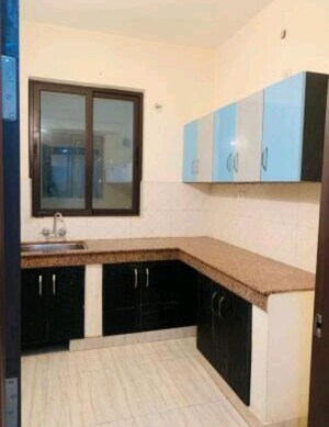 Kitchen in 2 BHK Apartment at Rishita Manhattan, Gomti Nagar – for Rent