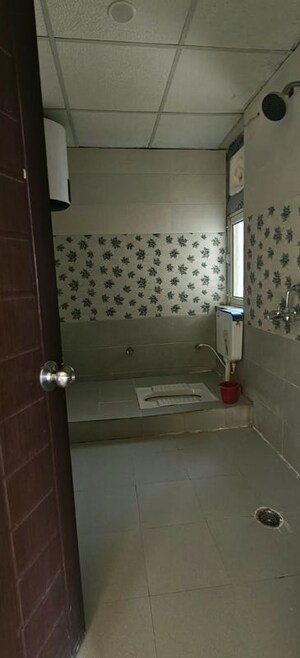 Bathroom in 2 BHK Apartment at Ansal API Celebrity Gardens, Sushant Golf City – for Rent