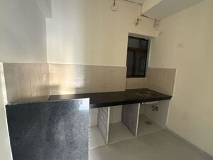 Kitchen in 2 BHK Apartment at Siddha Sky Phase 3, Wadala – for Sale