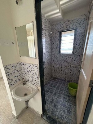Bathroom in 1 BHK Apartment at Meghmalhar CHS Ghansoli, Ghansoli – for Rent