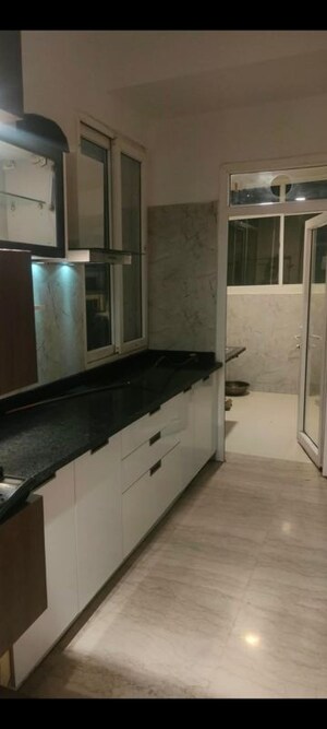 Kitchen in 3 BHK Apartment at Prateek Edifice, Sector 107 – for Rent