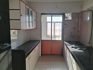 Kitchen in 3 BHK Apartment at Bhutra Prem Nagar, Mira Road East – for Rent