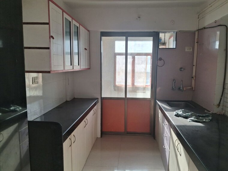 Kitchen, bhutra-prem-nagar 3 Bedroom 1300 Sq.Ft. Apartment In Mira Road East Thane 10753346