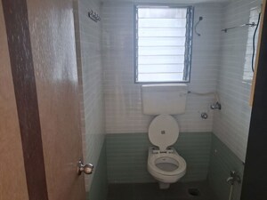 Bathroom in 3 BHK Apartment at Bhutra Prem Nagar, Mira Road East – for Rent