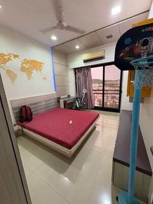 Bedroom in 2 BHK Apartment at K Raheja Heights, Malad East – for Rent