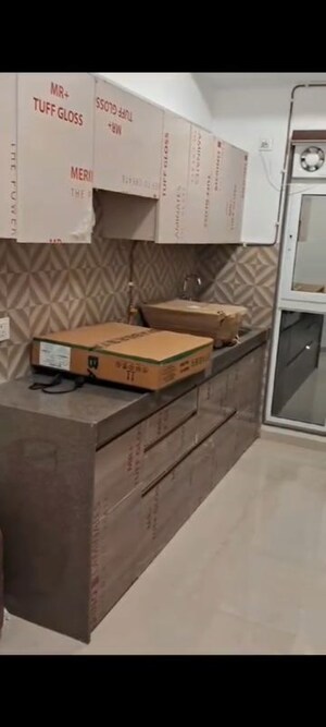 Kitchen in 2 BHK Apartment at Andheri CHS, Andheri West – for Rent