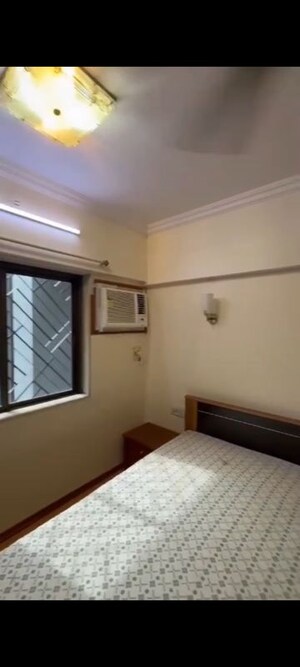 Room in 2 BHK Apartment at Andheri CHS, Andheri West – for Rent